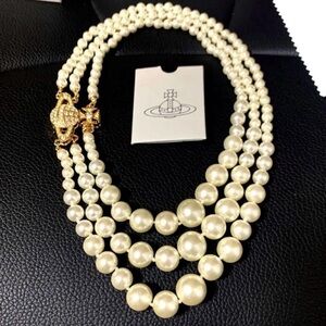Vivienne Westwood Graziella Triple Strand Pearl Necklace Saturn closure.